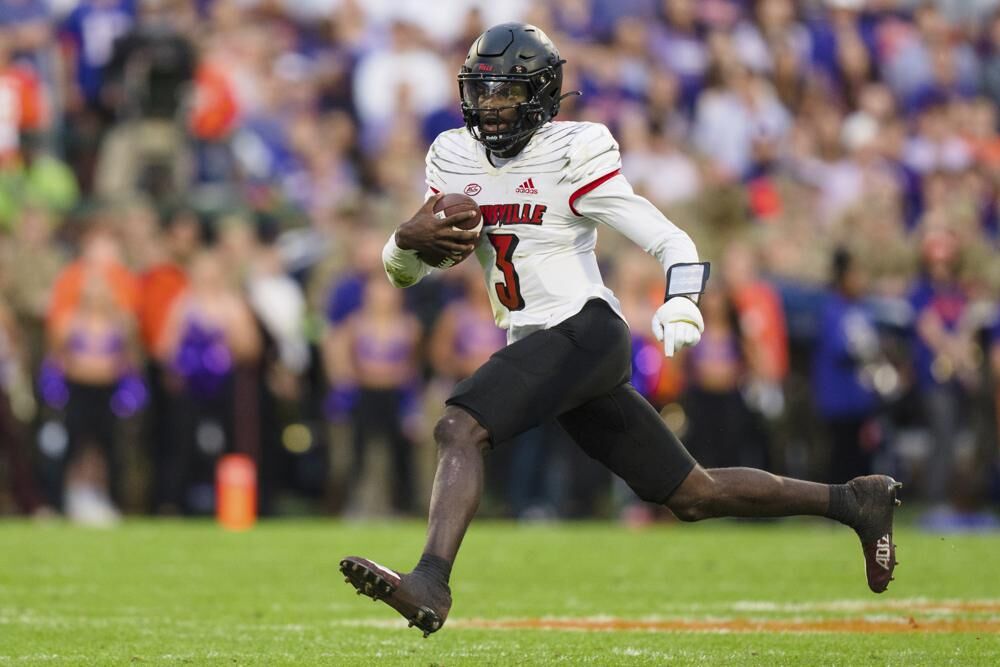 Louisville quarterback Malik Cunningham runs with the ball.jpeg